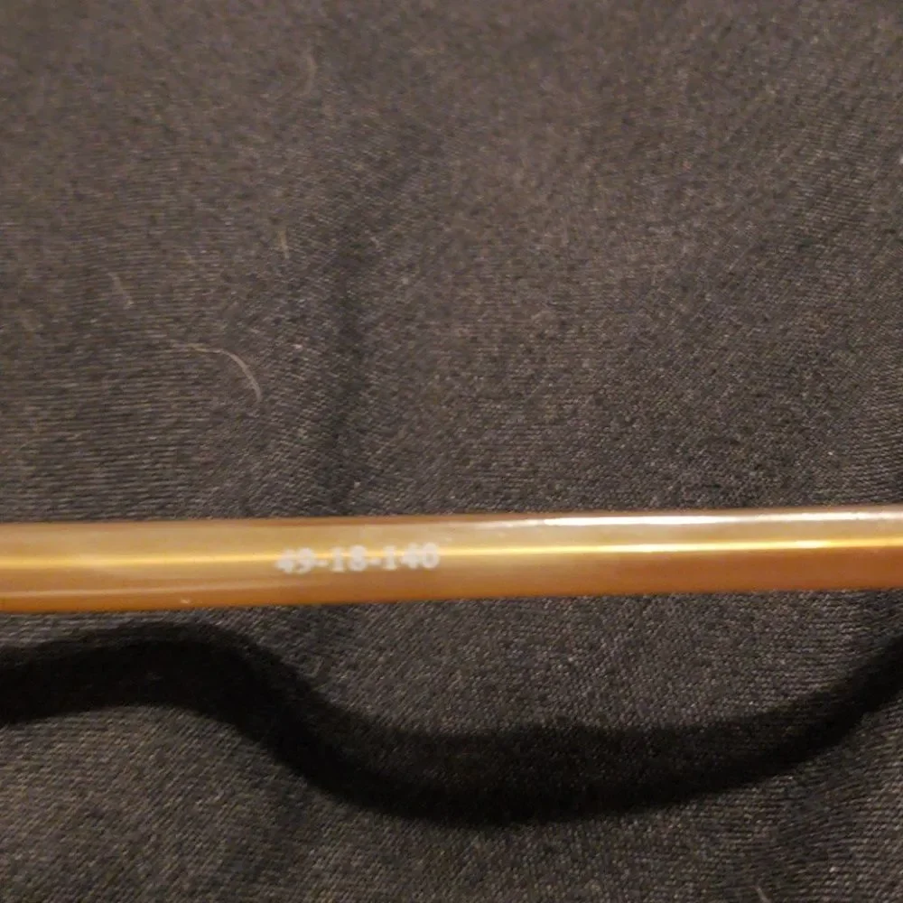 Brown square/oval glasses
